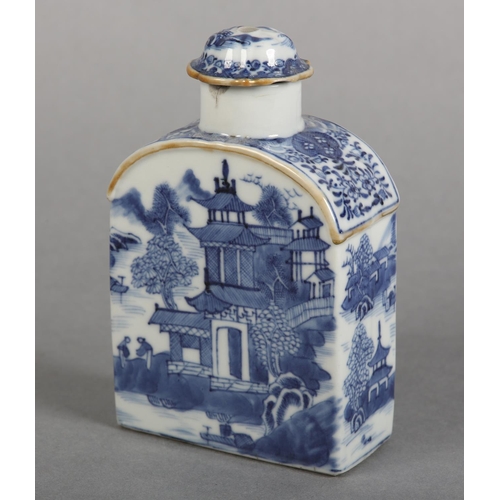 174 - AN 18TH CENTURY CHINESE BLUE AND WHITE PLATE painted with rocks issuing blossom within a diaper bord... 