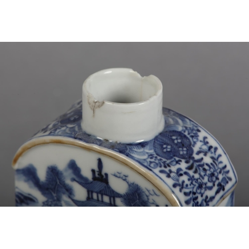 174 - AN 18TH CENTURY CHINESE BLUE AND WHITE PLATE painted with rocks issuing blossom within a diaper bord... 