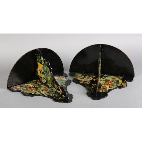 318 - A PAIR OF AESTHETIC MOVEMENT BLACK PAPIER MACHE FOLDING WALL BRACKET, decorated with polychrome and ... 