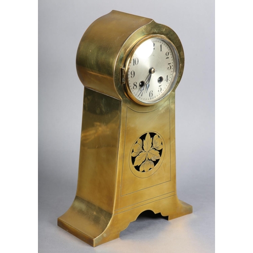 130 - AN ART NOUVEAU BRASS CASED MANTEL CLOCK, having a circular silvered dial with black Arabic numerals,... 