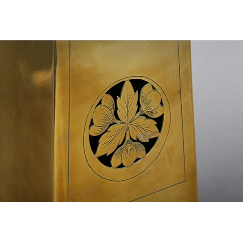 130 - AN ART NOUVEAU BRASS CASED MANTEL CLOCK, having a circular silvered dial with black Arabic numerals,... 