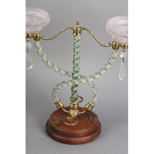 101 - A 19TH CENTURY CLARKE'S PATENT CRICKLITE HOLDER, having twin moulded glass sconces raised on three c... 