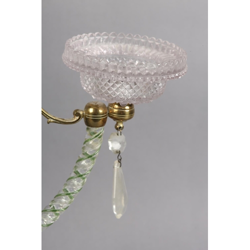 101 - A 19TH CENTURY CLARKE'S PATENT CRICKLITE HOLDER, having twin moulded glass sconces raised on three c... 