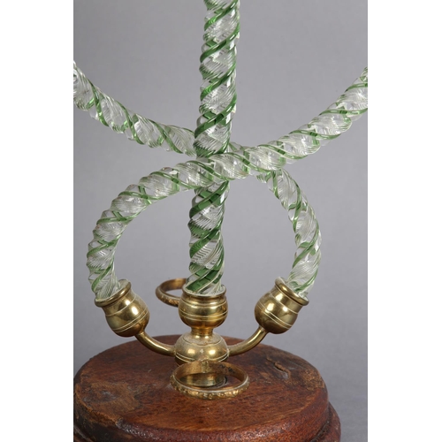 101 - A 19TH CENTURY CLARKE'S PATENT CRICKLITE HOLDER, having twin moulded glass sconces raised on three c... 