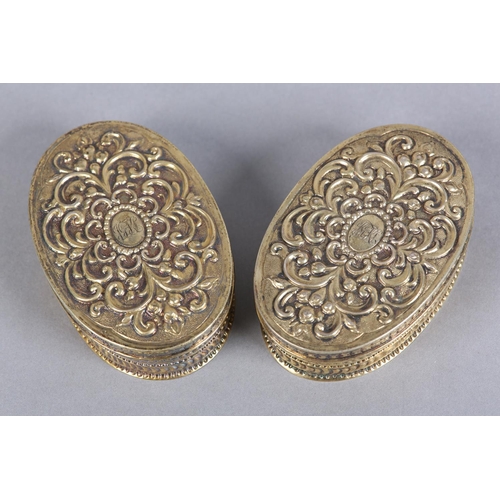 201 - A PAIR OF VICTORIAN SILVER GILT BOXES, London 1883, maker Rosenthal, Jacob & Co, of oval outline, th... 