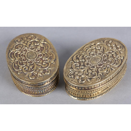 201 - A PAIR OF VICTORIAN SILVER GILT BOXES, London 1883, maker Rosenthal, Jacob & Co, of oval outline, th... 