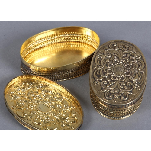 201 - A PAIR OF VICTORIAN SILVER GILT BOXES, London 1883, maker Rosenthal, Jacob & Co, of oval outline, th... 