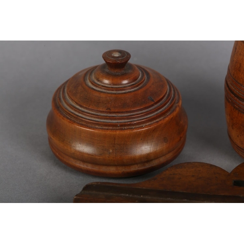 113 - A 19TH CENTURY TURNED FRUITWOOD BARREL-SHAPE BOX AND COVER, 9.5cm high, a turned bowl and cover, 6cm... 