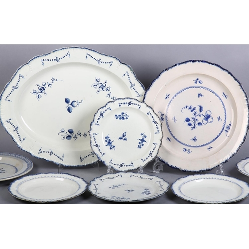 155 - A GROUP OF 18TH CENTURY FEATHER-EDGED PEARLWARE including a pair of Wedgwood plates and a soup plate... 