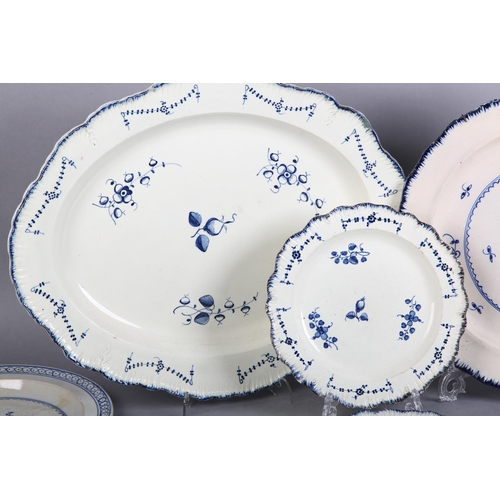 155 - A GROUP OF 18TH CENTURY FEATHER-EDGED PEARLWARE including a pair of Wedgwood plates and a soup plate... 