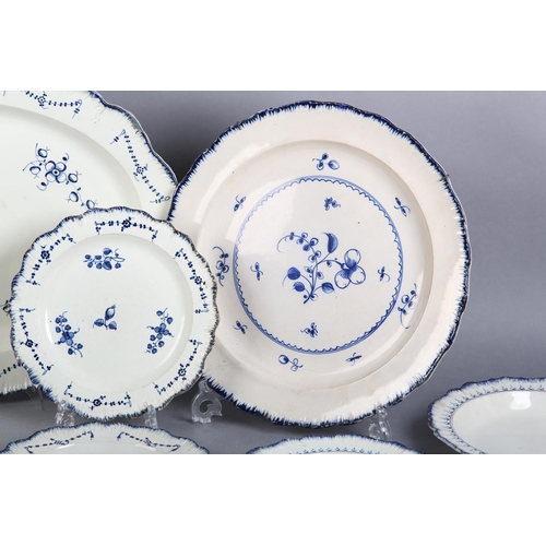 155 - A GROUP OF 18TH CENTURY FEATHER-EDGED PEARLWARE including a pair of Wedgwood plates and a soup plate... 