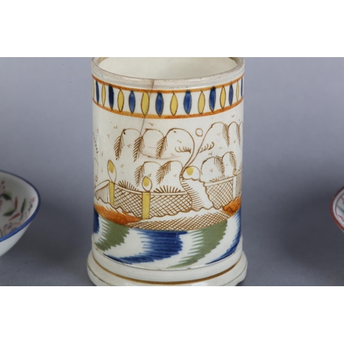 158 - AN 18TH CENTURY CREAMWARE MUG painted in orchre, blue, green and brown with a chinoiserie riverside ... 