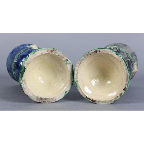 170 - A PAIR OF 19TH CENTURY MAJOLICA WINE GOBLETS c.1880, the bowls applied with lion masks and garlands ... 