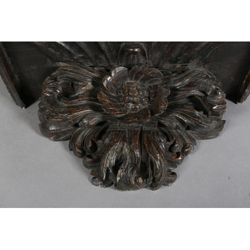 380 - A VICTORIAN OAK WALL BRACKET, rectangular with arcaded rim above a flower and foliate support, 72cm ... 