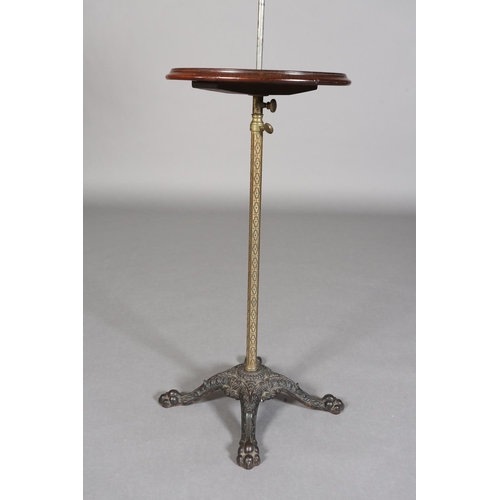 370 - A VICTORIAN MAHOGANY AND CAST IRON LECTERN on an adjustable arm and pedestal with circular table, on... 