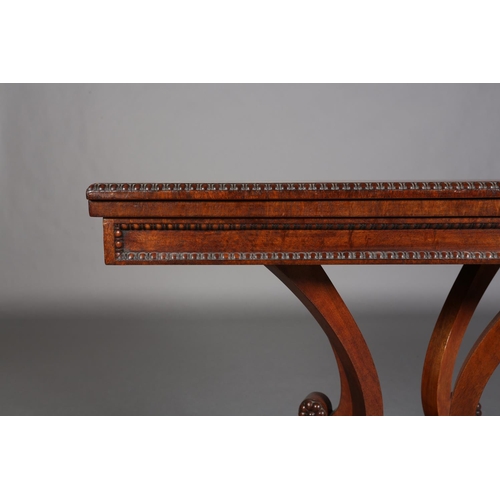 346 - A MID 19TH CENTURY MAHOGANY TEA TABLE, rectangular fold over top with egg and dart rim, on four scro... 