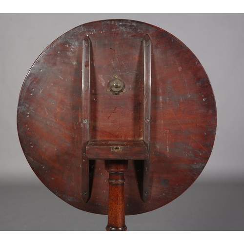 349 - A 19TH CENTURY MAHOGANY TILT TOP TABLE, circular, on a vase turned column on tripod base with pad fe... 