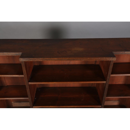 355 - A 19TH CENTURY MAHOGANY DWARF BREAKFRONT OPEN BOOKCASE, on vase turned feet, 131cm wide x 31cm deep ... 