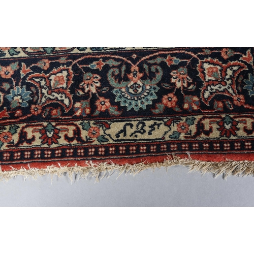 308 - A KASHAN CARPET, the ivory field having a central blue medallion filled with flowers, within a surro... 