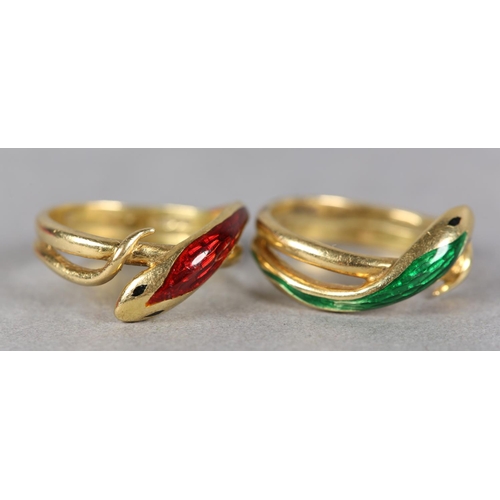 251 - A PAIR OF INTERLOCKING ENAMEL SNAKE RINGS in 18ct gold c1971, each ring set with black champlevé and... 