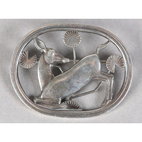 260 - A GEORG JENSEN 256 SILVER KNEELING HIND BROOCH designed by Arno Malinowski, approximately 43mm x 33m... 