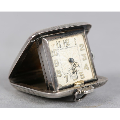 270 - AN ART DECO PURSE WATCH BY SAPHO, in silver engine turned folding case no. 2592, Birmingham 1932, Sw... 