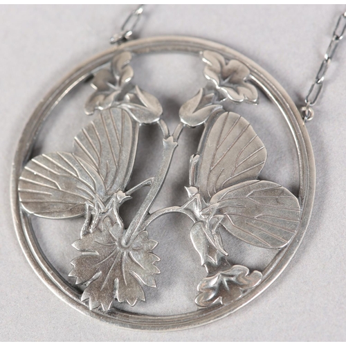 263 - A GEORG JENSEN 105 SILVER BUTTERFLY PENDANT designed by Arno Malinowski hung on a silver fetter link... 