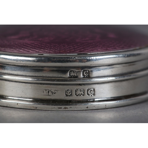 224 - A GEORGE V SILVER AND ENAMEL POWDER COMPACT, Birmingham 1927 Marson & Jones, the purple guilloche hi... 