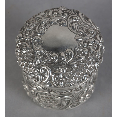 225 - A VICTORIAN SILVER TOILET JAR, London 1898 Drew & Sons, circular, all over foliate scroll embossed w... 