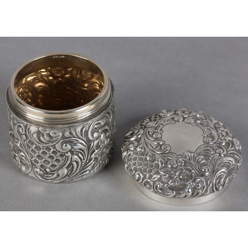 225 - A VICTORIAN SILVER TOILET JAR, London 1898 Drew & Sons, circular, all over foliate scroll embossed w... 