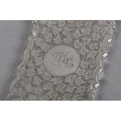 213 - A LATE VICTORIAN SILVER CARD CASE, Birmingham 1900 William M Hayes, all over foliate engraved with a... 