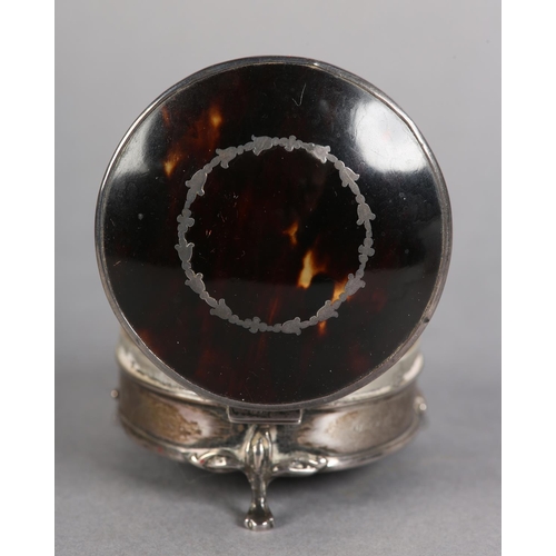 197 - A LATE 19TH CENTURY TORTOISESHELL AND SILVER JEWELLERY BOX, Birmingham 1922, circular with silk line... 