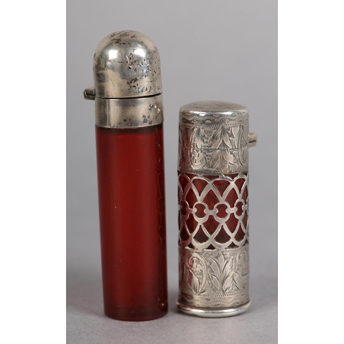 198 - AN EDWARD VII SILVER AND RUBY GLASS LINED SCENT BOTTLE, filigree band with engraved silver top and b... 