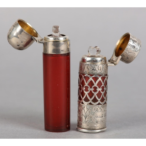 198 - AN EDWARD VII SILVER AND RUBY GLASS LINED SCENT BOTTLE, filigree band with engraved silver top and b... 