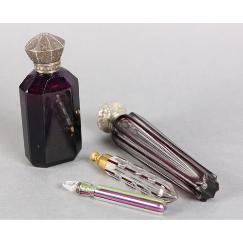 199 - A LATE 19TH CENTURY AMETHYST PANELLED GLASS SCENT FLASK with white metal hinged top engraved with le... 