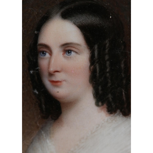 184 - A 19TH CENTURY PORTRAIT MINIATURE OF A LADY, c.1840, head and shoulders, her hair in ringlets, weari... 