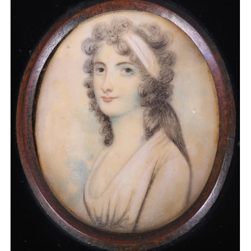 187 - AN EARLY 19TH CENTURY PORTRAIT MINIATURE OF A YOUNG LADY, in Regency dress, her hair caught in a pal... 