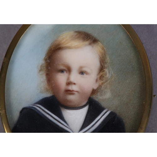 192 - A LATE 19TH/EARLY 20TH CENTURY PORTRAIT MINIATURE OF AN INFANT BOY, head and shoulders, wearing a sa... 