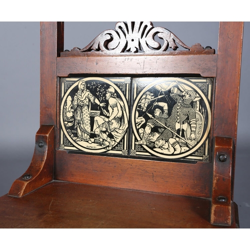 317 - A PAIR OF LATE 19TH CENTURY WALNUT HALL CHAIRS, the arched backs inset with tiles from the Minton Ea... 