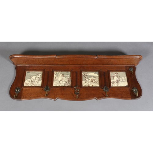 323 - A LATE 19TH CENTURY OAK HALL RACK inset with four tiles representing the months of April 30 days, Ma... 