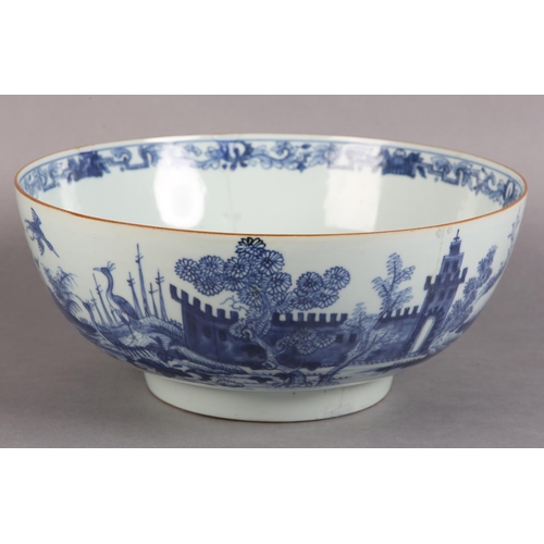 175 - AN 18TH CENTURY CHINESE BLUE AND WHITE BOWL, painted to the exterior with a fort and landscape crane... 