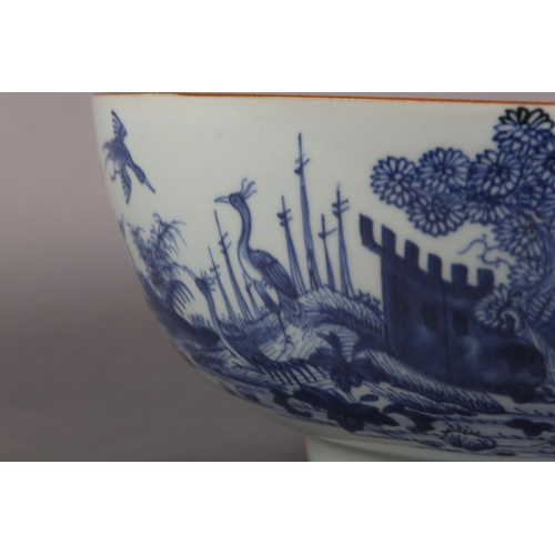 175 - AN 18TH CENTURY CHINESE BLUE AND WHITE BOWL, painted to the exterior with a fort and landscape crane... 