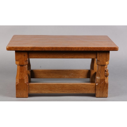 314 - A THOMPSON OF KILBURN OAK FOOTSTOOL, rectangular, an octagonal and square framing, carved in relief ... 