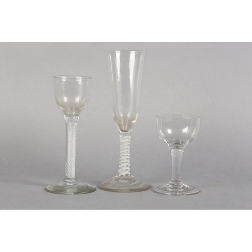 180 - AN 18TH CENTURY WINE GLASS having a drawn bowl on a double-series opaque twist stem on conical foot,... 