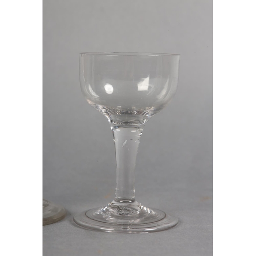 180 - AN 18TH CENTURY WINE GLASS having a drawn bowl on a double-series opaque twist stem on conical foot,... 