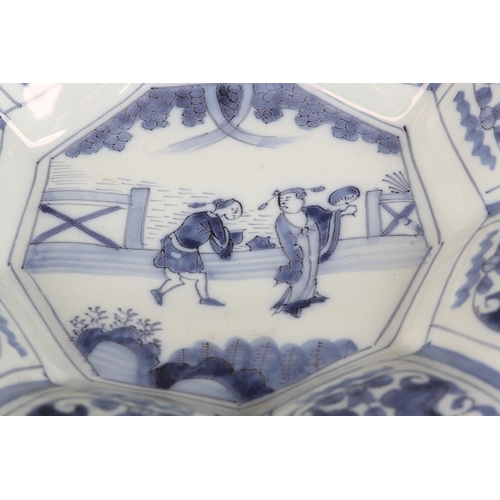 160 - AN 18TH CENTURY DUTCH DELFT LOBED DISH, painted in the chinoiserie manner with an elegant figure and... 