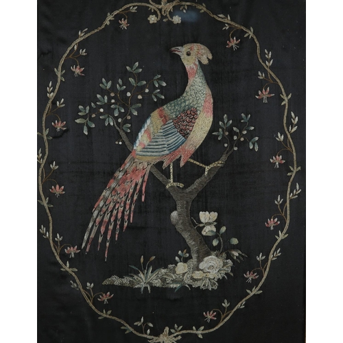 75 - A GEORGE III/IV SILK EMBROIDERY of an exotic bird of colourful plumage, perched in a blossom tree wi... 