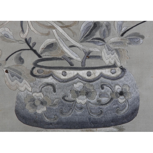 177 - A 19TH CENTURY CHINESE SILK EMBROIDERY in shades of grey and ivory worked with a vase of honeysuckle... 