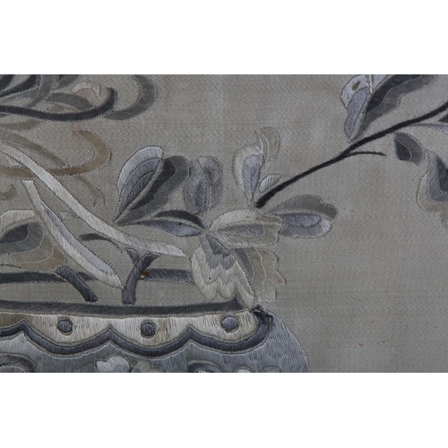 177 - A 19TH CENTURY CHINESE SILK EMBROIDERY in shades of grey and ivory worked with a vase of honeysuckle... 