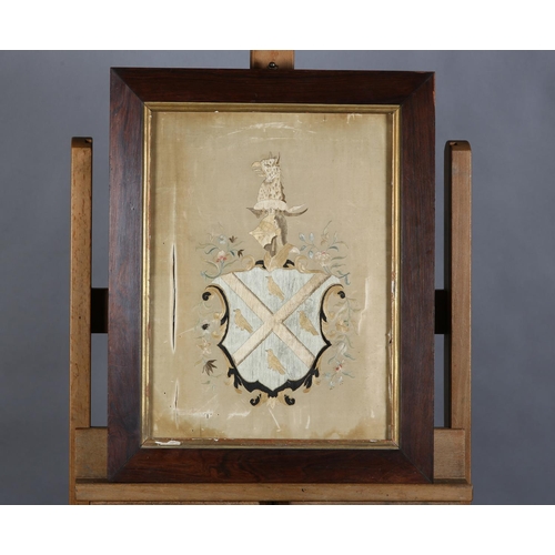 77 - AN EARLY 19TH CENTURY HERALDIC DESIGN in gros point on ivory silk, bearing arms of the Smyth family ... 